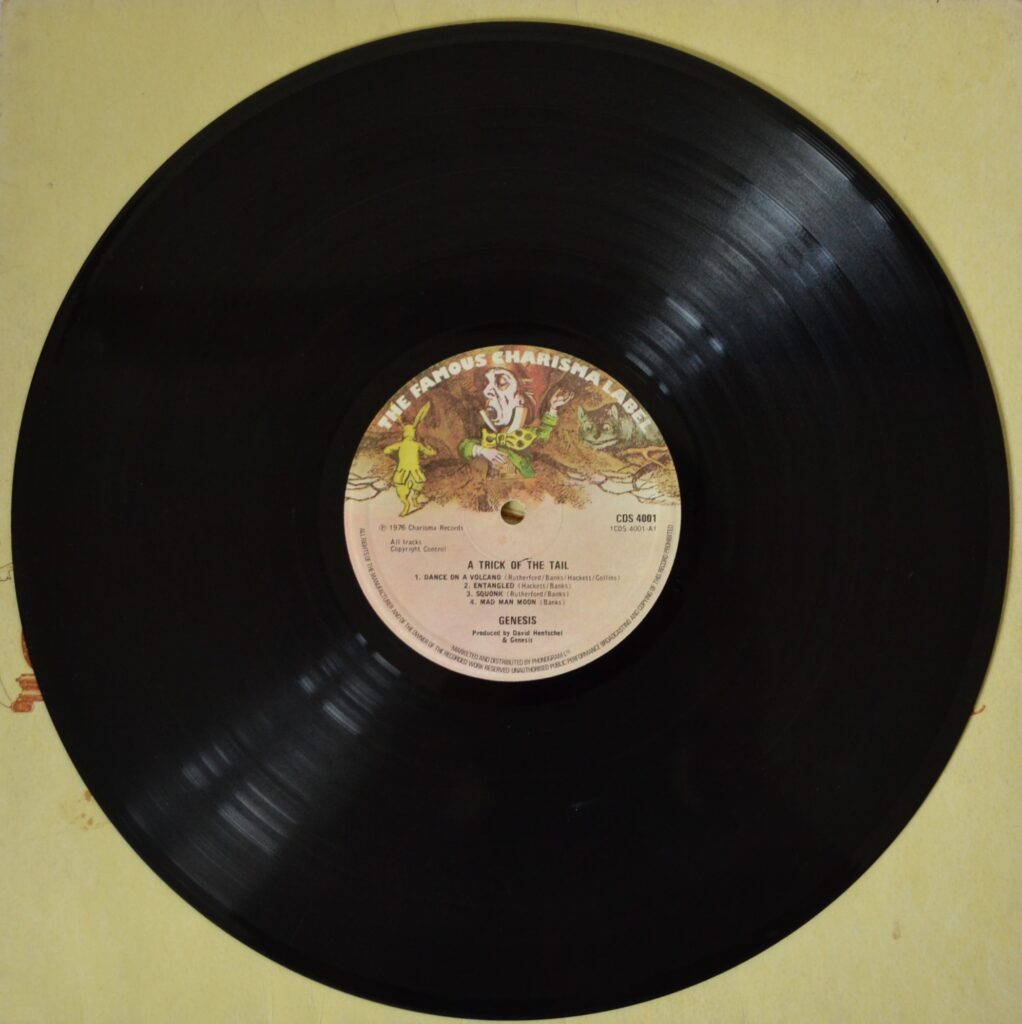 Genesis - Love Is A Trick Of The Tail a-trick-of-the-tail-record-one