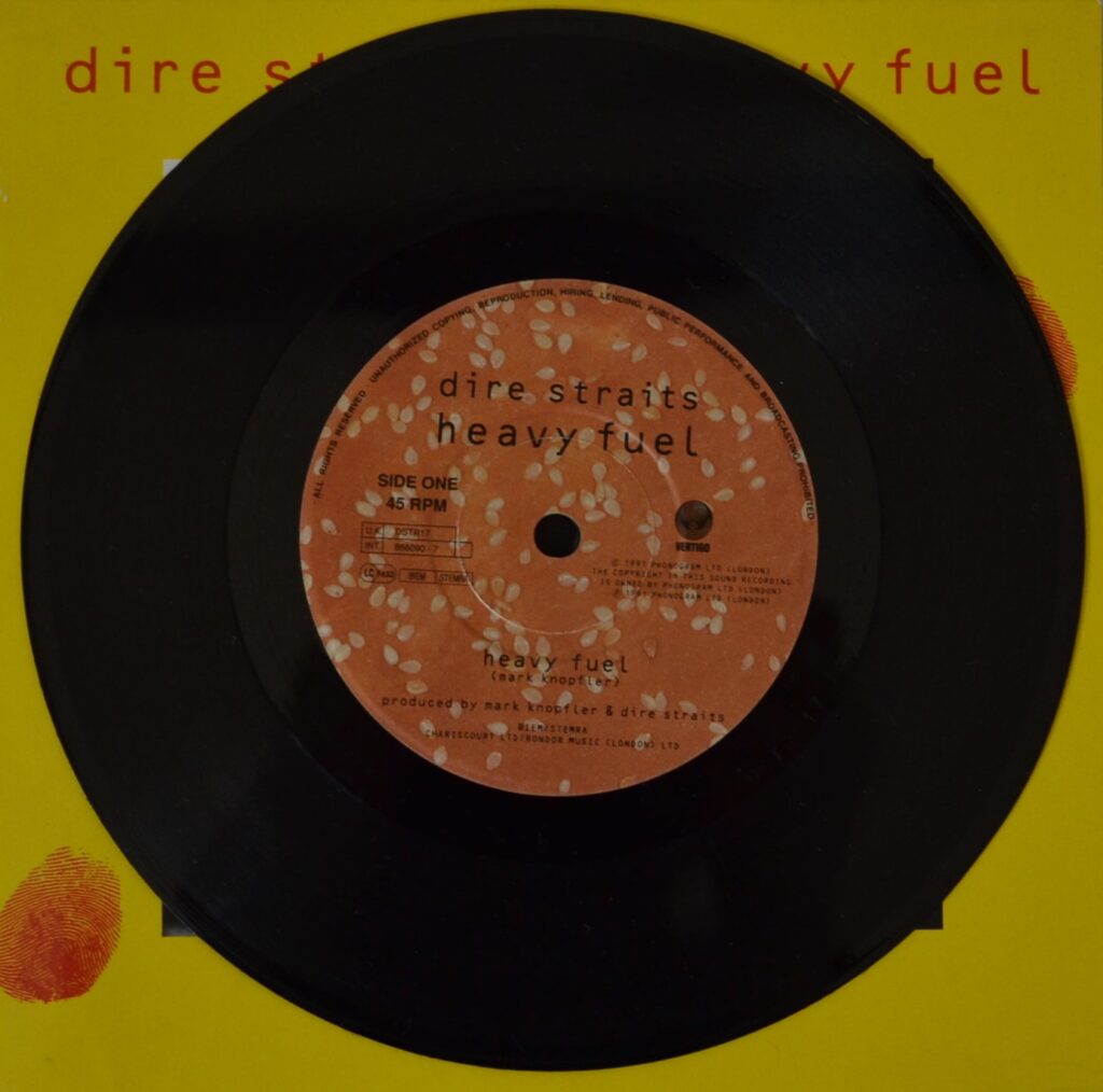 Dire Straits - Heavy Fuel Is Love For Life dire-straits-heavy-fuel-7-inches-record-side-one