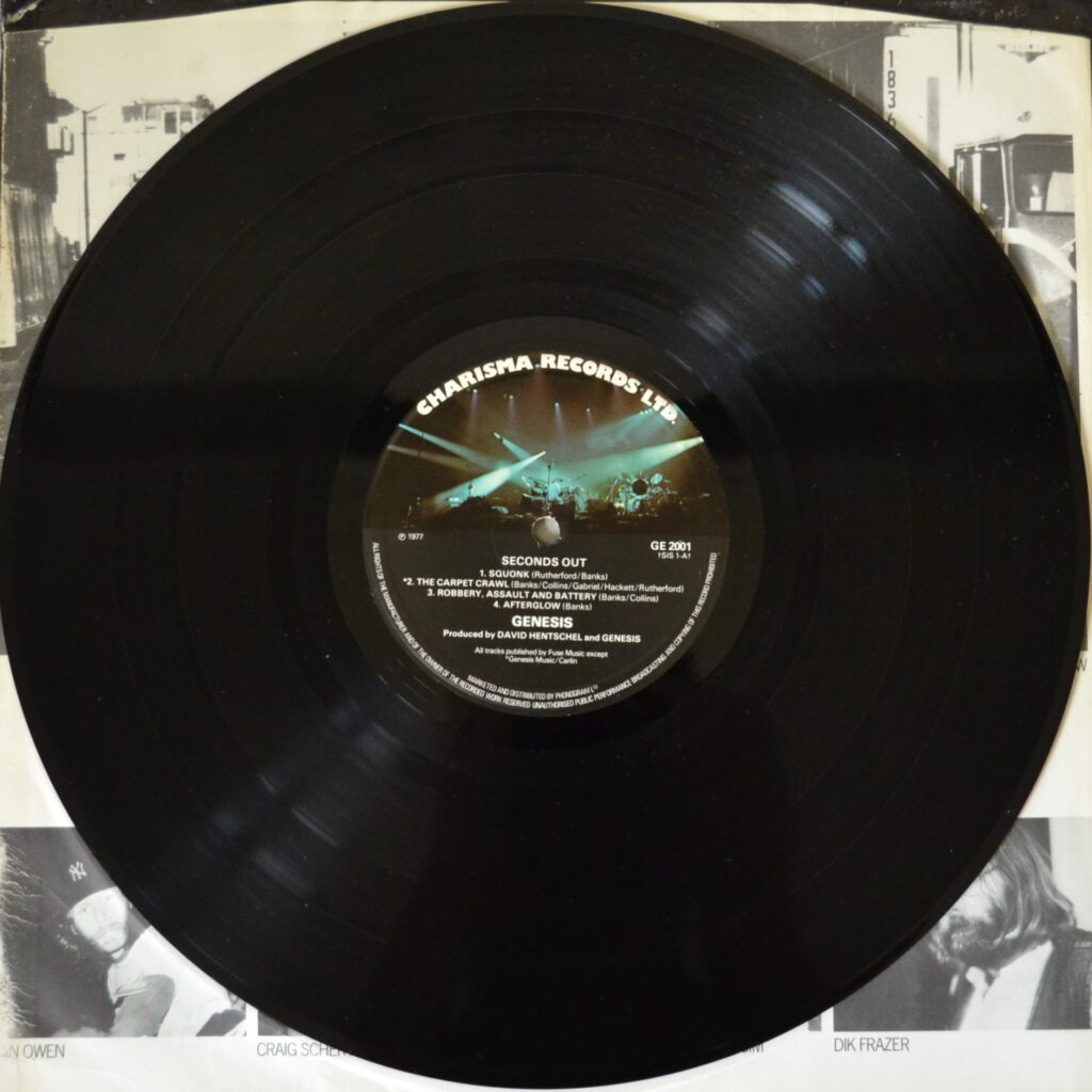 Genesis - Seconds Out, Bringing The Warmth Of New Life genesis-seconds-out-record-one-side-one-1