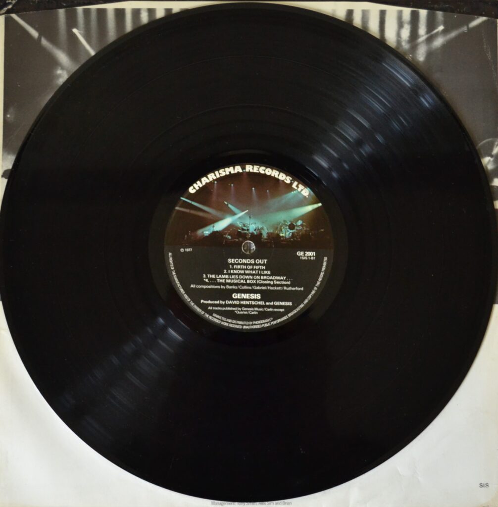 Genesis - Seconds Out, Bringing The Warmth Of New Life genesis-seconds-out-record-one-side-two-1.