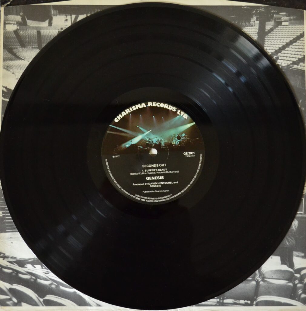 Genesis - Seconds Out, Bringing The Warmth Of New Life genesis-seconds-out-record-two-side-one