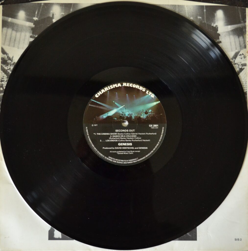 Genesis - Seconds Out, Bringing The Warmth Of New Life genesis-seconds-out-record-two-side-two