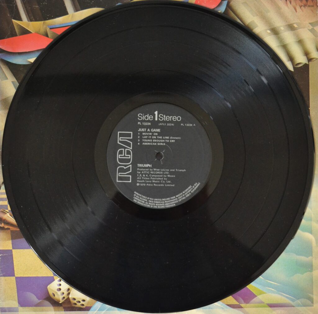 Triumph - Just A Game: Fantasy Serenade riumph-just-a-game-record-side-one.