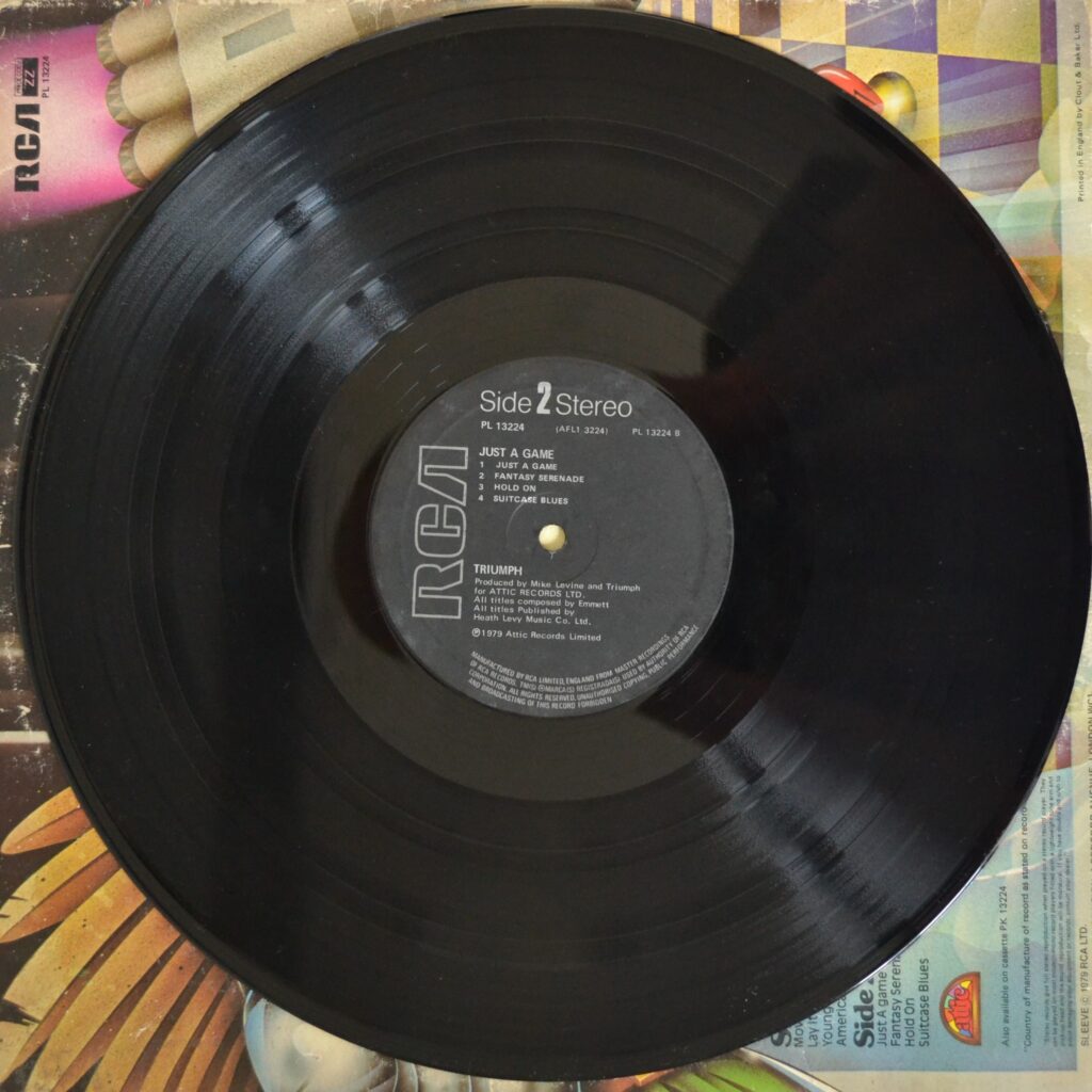 Triumph - Just A Game: Fantasy Serenade triumph-just-a-game-record-side-two