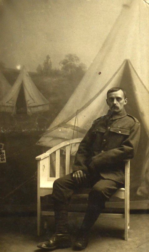 The Echoes Of War: Ww1 Through Unique Historical Photographs photo-british-soldier-in-a-chair