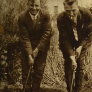 two-british-playing-golf-and-smoking