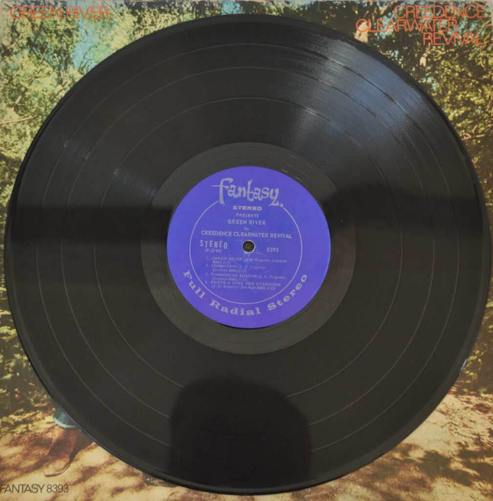 Creedence Clearwater Revival - Green River And The Night Time Is The Right Time creedence-clearwater-revival-green-river-record-side-one.