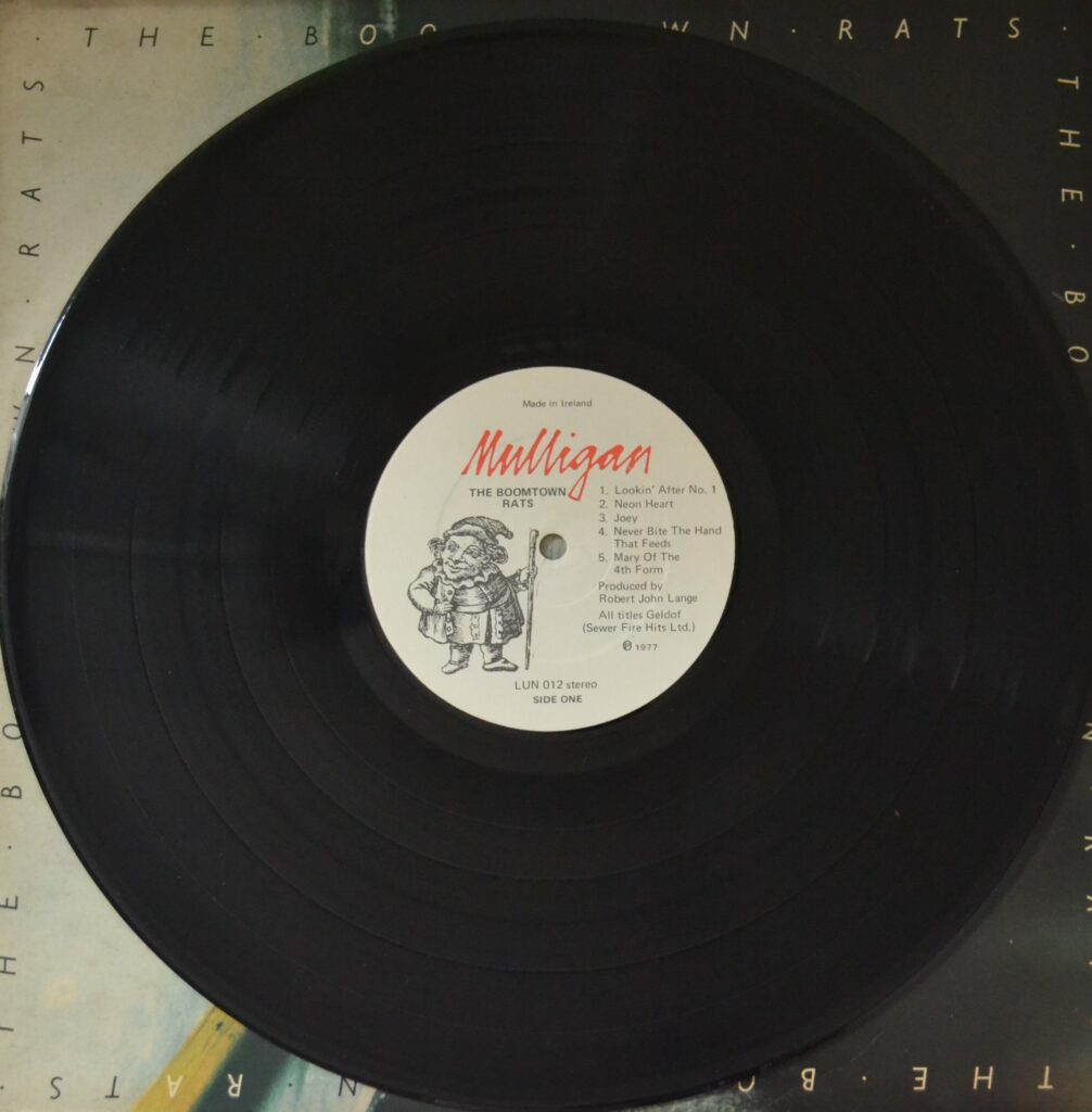 The Boomtown Rats - Never Bite The Hands That Feeds the-boomtown-rats-ireland-record-side-one.