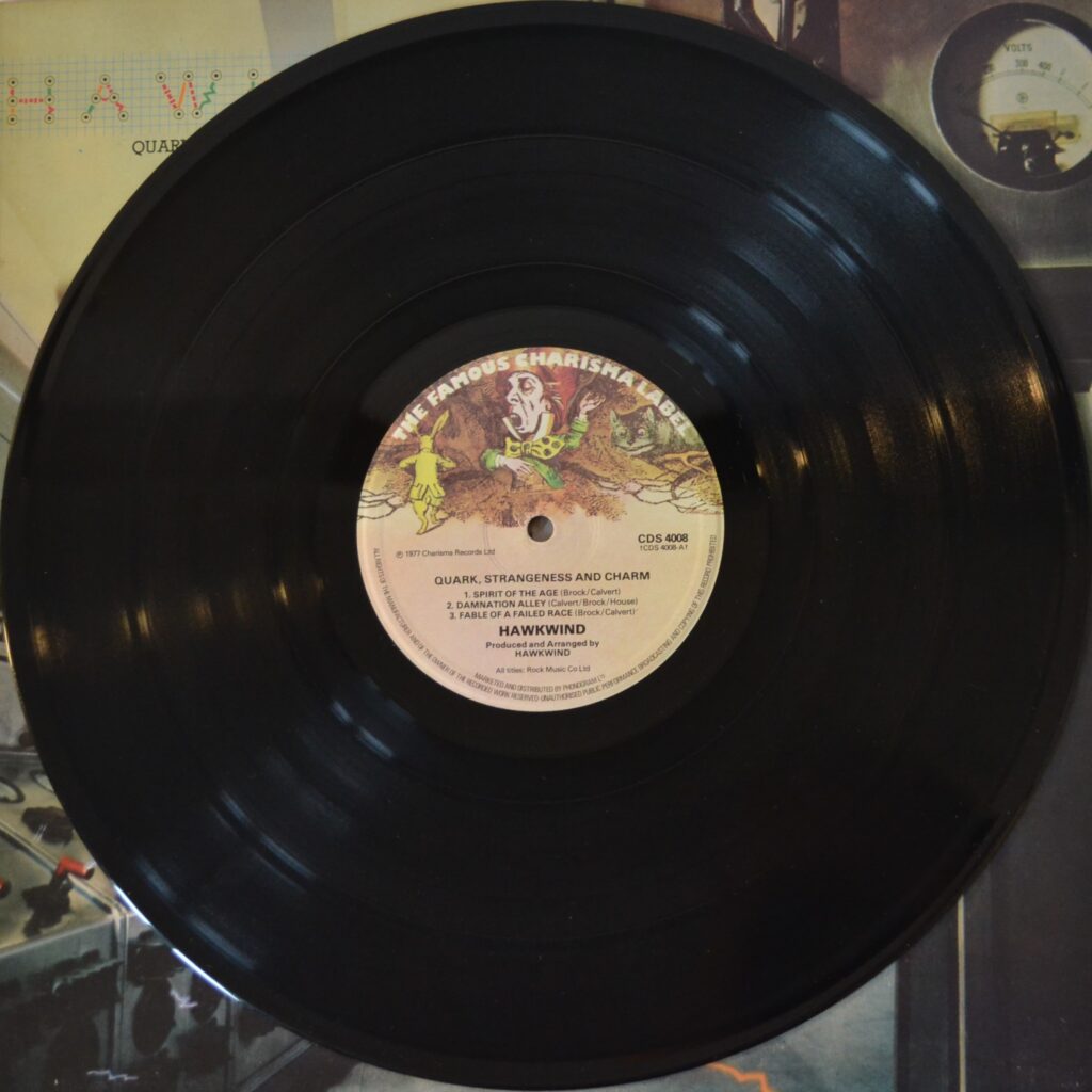 Hawkwind - Quark Strangeness And Charm And The Spirit Of The Age hawkwind-quark-strangeness-and-charm-record-side-one.